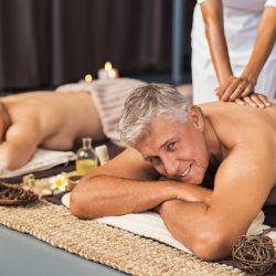 mature-couple-spa-getting-massage_256588-756